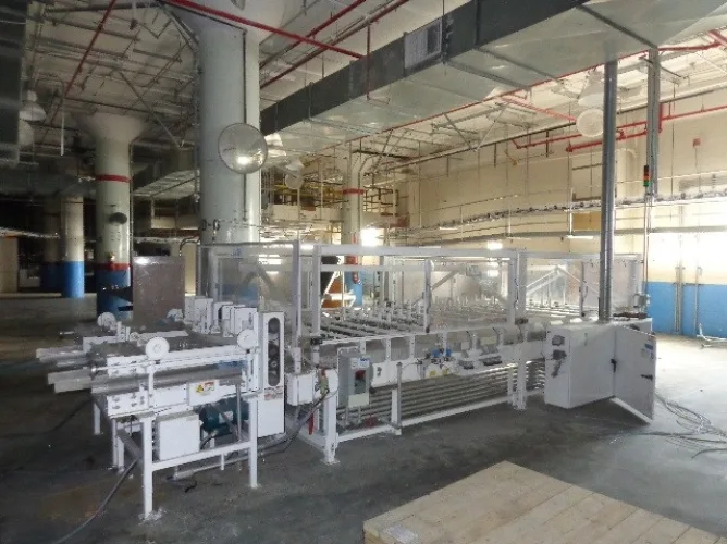 Photo #3 of TISSUE CONVERTING EQUIPMENT FORMERLY OF KIMBERLY CLARK: INCLUDING (2) INFINITY MACHINE & ENGINEERING CO. BUNDLER'S, (2) SSI 150 HP SHREDDERS & MUCH MORE!