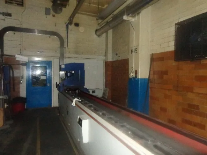 Photo #4 of TISSUE CONVERTING EQUIPMENT FORMERLY OF KIMBERLY CLARK: INCLUDING (2) INFINITY MACHINE & ENGINEERING CO. BUNDLER'S, (2) SSI 150 HP SHREDDERS & MUCH MORE!