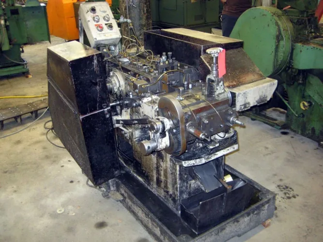 Photo #2 of SURPLUS TO THE ONGOING NEEDS OF L & M MANUFACTURING - HIGH SPEED FASTENER MANUFACTURING MACHINERY: COLD HEADERS, THREAD ROLLERS, PINCH POINTERS & MUCH MORE