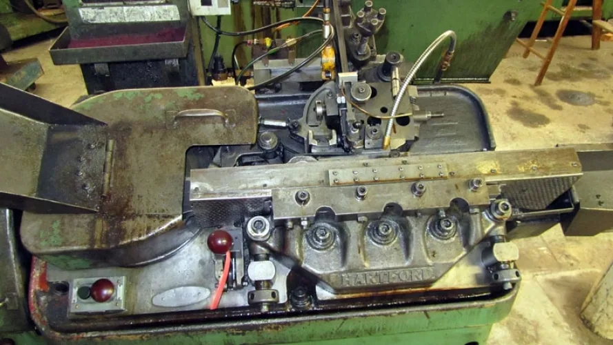Photo #86 of SURPLUS TO THE ONGOING NEEDS OF L & M MANUFACTURING - HIGH SPEED FASTENER MANUFACTURING MACHINERY: COLD HEADERS, THREAD ROLLERS, PINCH POINTERS & MUCH MORE