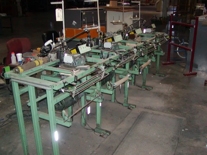 Photo #86 of NO LONGER REQUIRED IN THE CONTINUING OPERATIONS OF SPRINGS GLOBAL US, INC., INCLUDING: (226) SEWING MACHINES -  BROTHER, FISCHENBEIN, JUKI, KING, MAUSER & MANY MORE,  STUFFING/FILLING MACHINES, PANEL CUTTERS & MUCH MORE!