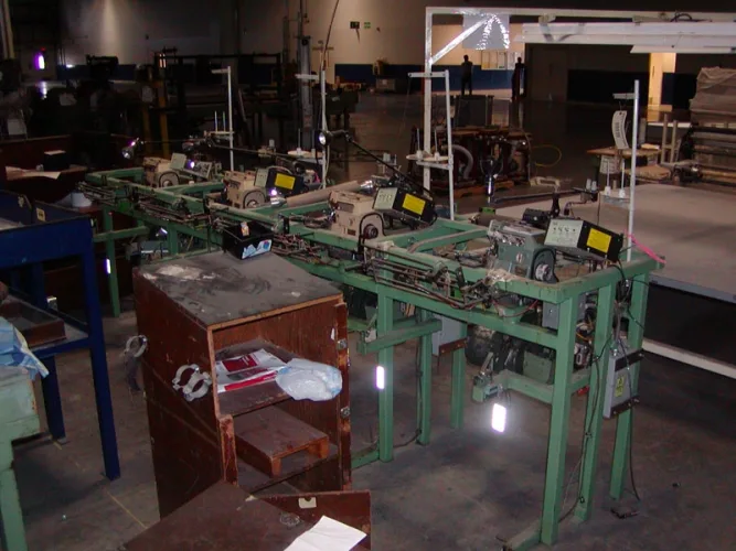 Photo #87 of NO LONGER REQUIRED IN THE CONTINUING OPERATIONS OF SPRINGS GLOBAL US, INC., INCLUDING: (226) SEWING MACHINES -  BROTHER, FISCHENBEIN, JUKI, KING, MAUSER & MANY MORE,  STUFFING/FILLING MACHINES, PANEL CUTTERS & MUCH MORE!