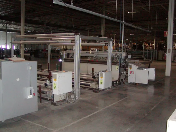 Photo #103 of NO LONGER REQUIRED IN THE CONTINUING OPERATIONS OF SPRINGS GLOBAL US, INC., INCLUDING: (226) SEWING MACHINES -  BROTHER, FISCHENBEIN, JUKI, KING, MAUSER & MANY MORE,  STUFFING/FILLING MACHINES, PANEL CUTTERS & MUCH MORE!