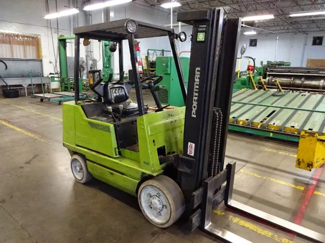 Photo #12 of THE FORMER ASSETS OF WELLMAN CONTAINER CORP - COMPLETE CORRUGATED CARDBOARD BOX MANUFACTURING & PRINTING FACILITY INCLUDING: CORRUGATED PRINTERS, DIE CUTTERS, SLITTERS, BOX FOLDING LINES & MORE