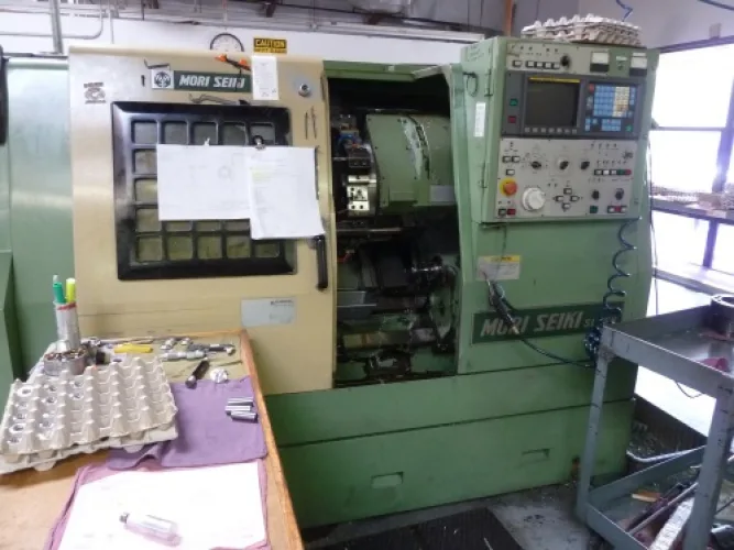Photo #20 of GARRETT PRECISION, INC. - CNC VERTICAL MACHINING & TURNING CENTERS, VERTICAL MILLING MACHINES, LATHES, SAW, DRILL PRESS, LARGE ASSORTMENT OF RAW STEEL & MUCH MORE
