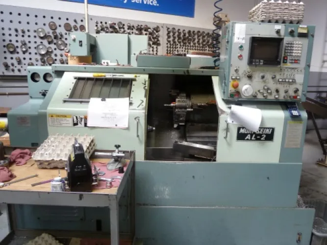 Photo #21 of GARRETT PRECISION, INC. - CNC VERTICAL MACHINING & TURNING CENTERS, VERTICAL MILLING MACHINES, LATHES, SAW, DRILL PRESS, LARGE ASSORTMENT OF RAW STEEL & MUCH MORE