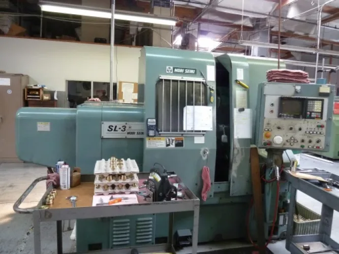 Photo #22 of GARRETT PRECISION, INC. - CNC VERTICAL MACHINING & TURNING CENTERS, VERTICAL MILLING MACHINES, LATHES, SAW, DRILL PRESS, LARGE ASSORTMENT OF RAW STEEL & MUCH MORE