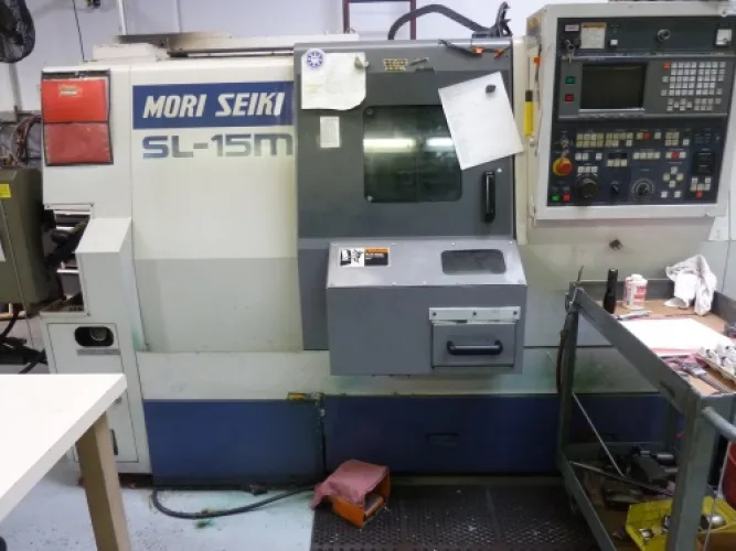 Photo #24 of GARRETT PRECISION, INC. - CNC VERTICAL MACHINING & TURNING CENTERS, VERTICAL MILLING MACHINES, LATHES, SAW, DRILL PRESS, LARGE ASSORTMENT OF RAW STEEL & MUCH MORE
