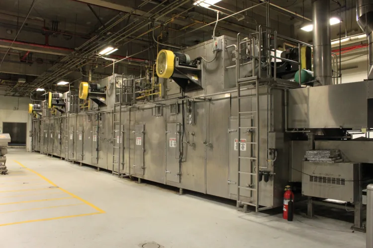 Photo #3 of BAKING & PACKAGING EQUIPMENT FORMERLY OF NESTLE: (2) CPM WOLVERINE 4-ZONE AIR IMPINGEMENT OVENS & (6) FUJI MODEL FW3700 HORIZONTAL FLOW WRAPPERS
