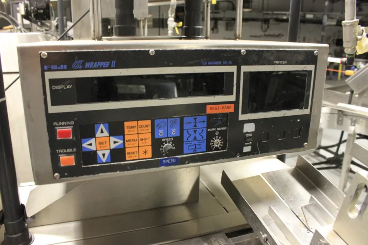Photo #7 of BAKING & PACKAGING EQUIPMENT FORMERLY OF NESTLE: (2) CPM WOLVERINE 4-ZONE AIR IMPINGEMENT OVENS & (6) FUJI MODEL FW3700 HORIZONTAL FLOW WRAPPERS