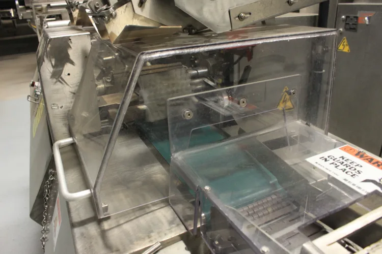 Photo #8 of BAKING & PACKAGING EQUIPMENT FORMERLY OF NESTLE: (2) CPM WOLVERINE 4-ZONE AIR IMPINGEMENT OVENS & (6) FUJI MODEL FW3700 HORIZONTAL FLOW WRAPPERS