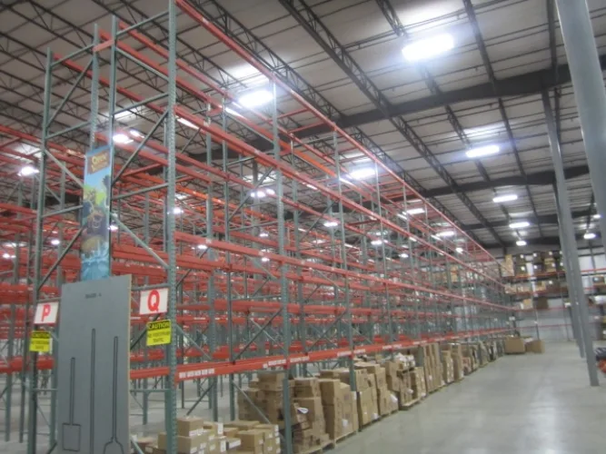 Photo #2 of APPROX. (640) SECTIONS OF INTERLAKE 30 TEARDROP PALLET RACKING & GRAVITY FLOW RACKING, INCLINE & DECLINE BELTED & POWERED ROLLER CONVEYORS, (10) CROWN ORDER PICKERS, REACH TRUCKS & ELECTRIC TRUCKS, (9) VARIOUS BATTERY CHARGERS & SPARE BATTERIES & MUCH