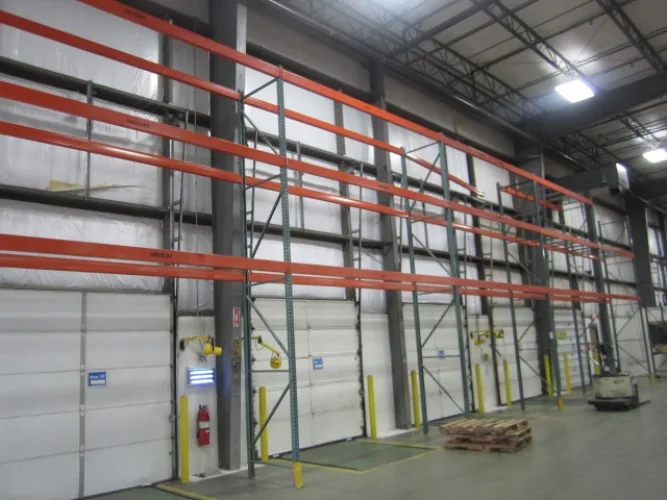 Photo #11 of APPROX. (640) SECTIONS OF INTERLAKE 30 TEARDROP PALLET RACKING & GRAVITY FLOW RACKING, INCLINE & DECLINE BELTED & POWERED ROLLER CONVEYORS, (10) CROWN ORDER PICKERS, REACH TRUCKS & ELECTRIC TRUCKS, (9) VARIOUS BATTERY CHARGERS & SPARE BATTERIES & MUCH