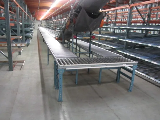Photo #18 of APPROX. (640) SECTIONS OF INTERLAKE 30 TEARDROP PALLET RACKING & GRAVITY FLOW RACKING, INCLINE & DECLINE BELTED & POWERED ROLLER CONVEYORS, (10) CROWN ORDER PICKERS, REACH TRUCKS & ELECTRIC TRUCKS, (9) VARIOUS BATTERY CHARGERS & SPARE BATTERIES & MUCH