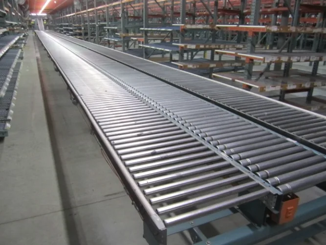 Photo #20 of APPROX. (640) SECTIONS OF INTERLAKE 30 TEARDROP PALLET RACKING & GRAVITY FLOW RACKING, INCLINE & DECLINE BELTED & POWERED ROLLER CONVEYORS, (10) CROWN ORDER PICKERS, REACH TRUCKS & ELECTRIC TRUCKS, (9) VARIOUS BATTERY CHARGERS & SPARE BATTERIES & MUCH