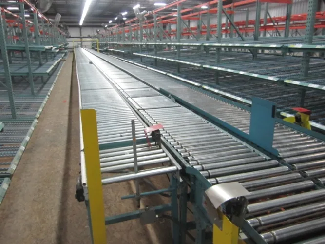 Photo #22 of APPROX. (640) SECTIONS OF INTERLAKE 30 TEARDROP PALLET RACKING & GRAVITY FLOW RACKING, INCLINE & DECLINE BELTED & POWERED ROLLER CONVEYORS, (10) CROWN ORDER PICKERS, REACH TRUCKS & ELECTRIC TRUCKS, (9) VARIOUS BATTERY CHARGERS & SPARE BATTERIES & MUCH