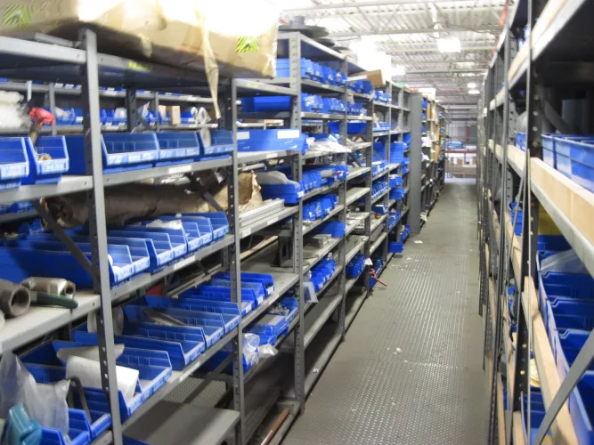Photo #4 of SURPLUS ASSETS TO THE ONGOING OPERATIONS OF THE CLOROX COMPANY - MACHINE SHOP, LARGE QUANTITY OF SPARE PARTS, S/S & FIBERGLASS TANKS, PEARSON CASE PACKER, TENNANT FLOOR SCRUBBERS, LAB EQUIPMENT, PALLET RACKING & MORE