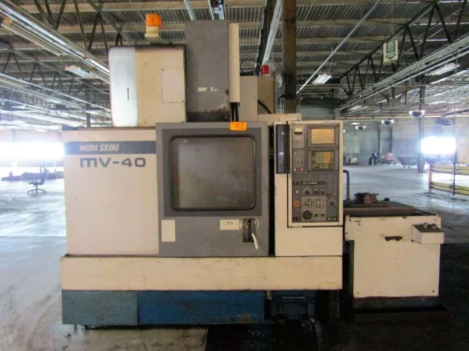 Photo #1 of SURPLUS ASSETS OF A LARGE BEARING MANUFACTURER, FEATURING: MAZAK CNC TURNING CENTER, "TOP" TURN CNC GANG CROSS SLIDE LATHES, OKUMA TURNING CENTERS, 75-TON PRESS, BLISS OBI PRESSES, GRINDERS, BANDSAWS & MORE