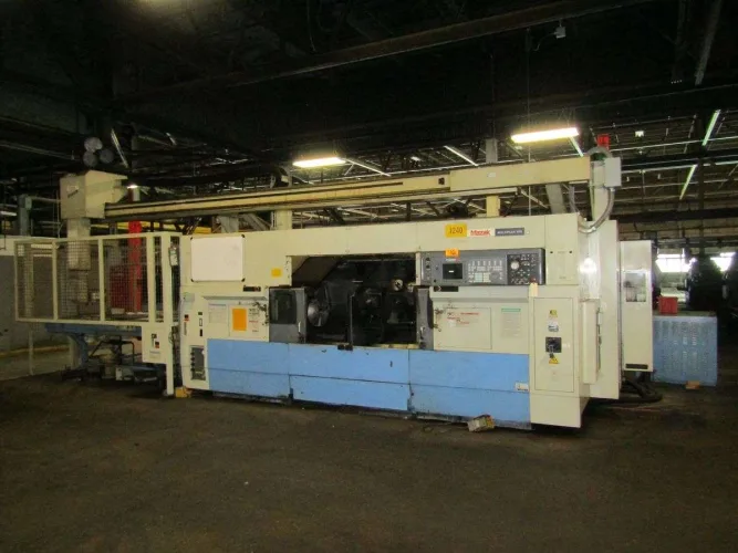 Photo #2 of SURPLUS ASSETS OF A LARGE BEARING MANUFACTURER, FEATURING: MAZAK CNC TURNING CENTER, "TOP" TURN CNC GANG CROSS SLIDE LATHES, OKUMA TURNING CENTERS, 75-TON PRESS, BLISS OBI PRESSES, GRINDERS, BANDSAWS & MORE