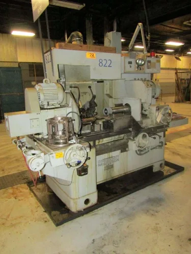 Photo #15 of SURPLUS ASSETS OF A LARGE BEARING MANUFACTURER, FEATURING: MAZAK CNC TURNING CENTER, "TOP" TURN CNC GANG CROSS SLIDE LATHES, OKUMA TURNING CENTERS, 75-TON PRESS, BLISS OBI PRESSES, GRINDERS, BANDSAWS & MORE