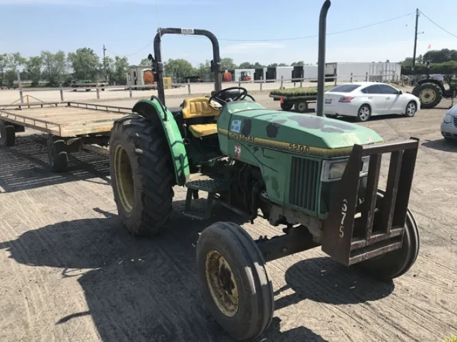 Photo #14 of GARDENS ALIVE FARMS - MI (EQUIPMENT) - EQUIPMENT AUCTION INCLUDES: 140+ JOHN DEERE TRACTORS, VOGEL ROOT DIGGER, CAT 120G MOTOR GRADER, WHEEL LOADERS, SKID STEER, TRENCHERS, PLOWS, BACKHOES, PUMPS, DUMP TRUCK, WAGONS, TRACTORS & TRAILERS,