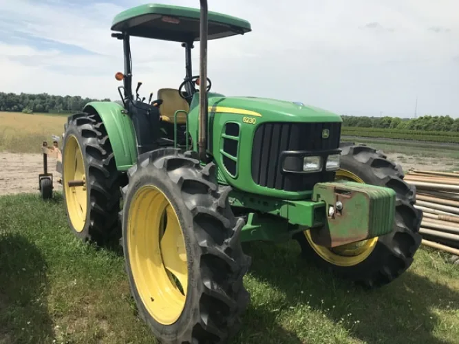 Photo #16 of GARDENS ALIVE FARMS - MI (EQUIPMENT) - EQUIPMENT AUCTION INCLUDES: 140+ JOHN DEERE TRACTORS, VOGEL ROOT DIGGER, CAT 120G MOTOR GRADER, WHEEL LOADERS, SKID STEER, TRENCHERS, PLOWS, BACKHOES, PUMPS, DUMP TRUCK, WAGONS, TRACTORS & TRAILERS,
