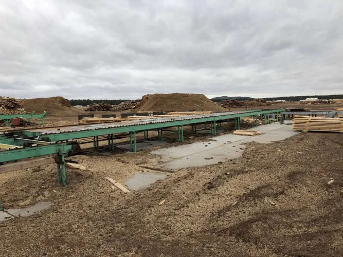 Photo #25 of NEWPAC FIBRE - LARGE/SMALL SAWMILL, FEATURING: LATE-MODEL WOOD PROCESSING/LOGGING EQUIPMENT