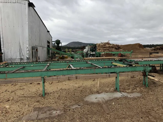 Photo #26 of NEWPAC FIBRE - LARGE/SMALL SAWMILL, FEATURING: LATE-MODEL WOOD PROCESSING/LOGGING EQUIPMENT