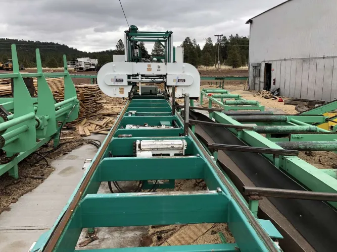 Photo #31 of NEWPAC FIBRE - LARGE/SMALL SAWMILL, FEATURING: LATE-MODEL WOOD PROCESSING/LOGGING EQUIPMENT