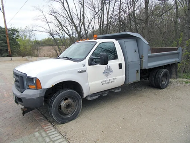 Photo #3 of EQUIPMENT AVAILABLE FROM A COMMERCIAL & RESIDENTIAL LANDSCAPE DESIGN & CONSTRUCTION COMPANY, INCLUDING: (10) FORD, INTERNATIONAL, PETERBILT & FREIGHTLINER DUMP TRUCKS, (7) NEW HOLLAND, BOBCAT & CASE SKID STEERS, HARLO H300C TRACTOR, (7) FORD PICK UP