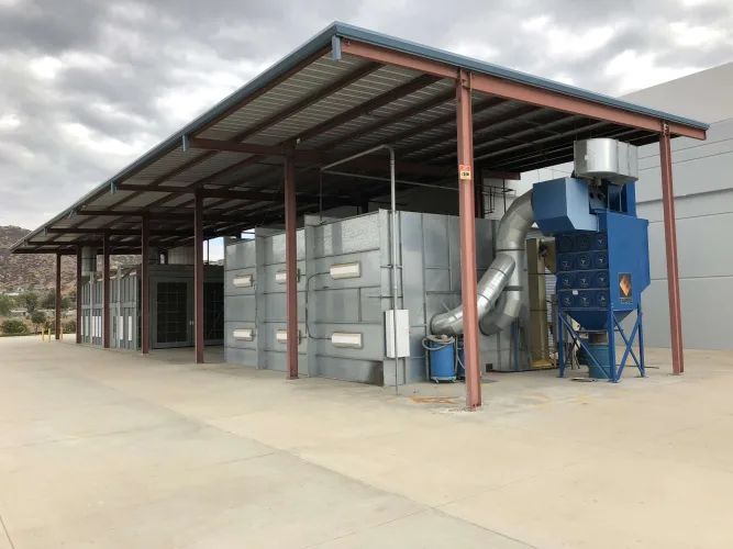 Photo #2 of EAGLEBURGMANN - ABRASIVE BLAST & SPRAY BOOTH W/ AWNING, DUST CONTAINMENT BOOTH, FREESTANDING BRIDGE CRANE SYSTEM, 1/2 TON & 2 TON JIB CRANES & LARGE QUANTITY OF HOSE REELS
