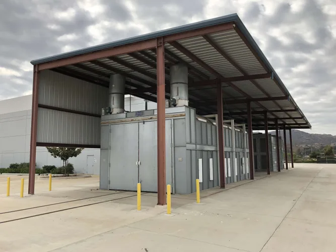 Photo #3 of EAGLEBURGMANN - ABRASIVE BLAST & SPRAY BOOTH W/ AWNING, DUST CONTAINMENT BOOTH, FREESTANDING BRIDGE CRANE SYSTEM, 1/2 TON & 2 TON JIB CRANES & LARGE QUANTITY OF HOSE REELS