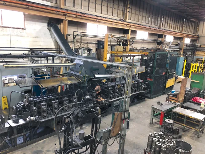 Photo #20 of ASSETS OF A TUBE MANUFACTURING FACILITY, FEATURING: (3) VAN_HUFFEL 12 STAND HYDRAULIC TUBE FORMING MILLS, YODER 6 STAND HYDRAULIC TUBE FORMING MILL, HAVEN, ORLICK & PINES TUBE CUT OFF SAWS, PINES VERTICAL TUBE BENDING MACHINE & MUCH MORE - KIRK