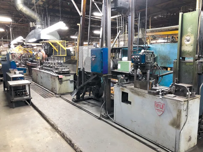 Photo #26 of ASSETS OF A TUBE MANUFACTURING FACILITY, FEATURING: (3) VAN_HUFFEL 12 STAND HYDRAULIC TUBE FORMING MILLS, YODER 6 STAND HYDRAULIC TUBE FORMING MILL, HAVEN, ORLICK & PINES TUBE CUT OFF SAWS, PINES VERTICAL TUBE BENDING MACHINE & MUCH MORE - KIRK