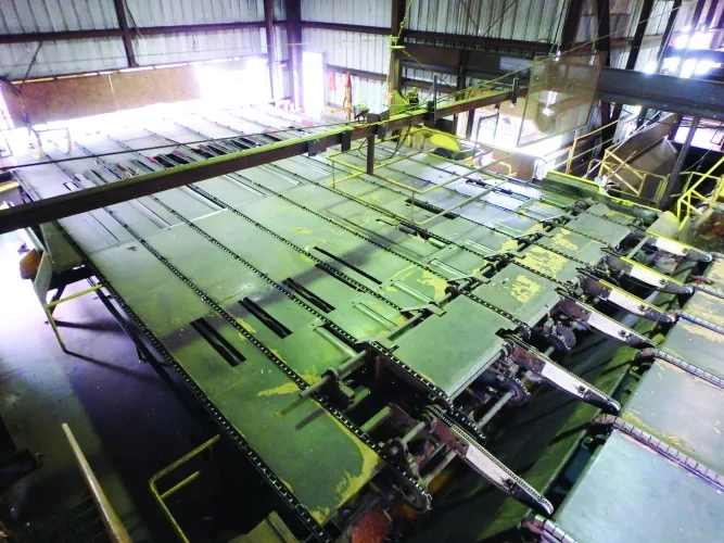 Photo #21 of SAWMILL AUCTION: 1994 NICHOLSON DEBARKER, HEADRIG & CARRIAGE, EDGERS, RESAWS, INFEED LOG HAUL & CUT OFF SAW, TIMBER SAW SYSTEM, PUSH PULL TRIMMER, CHIP SCREEN, BLOWER, FEEDER & VIBRATORY CONVEYOR & MUCH MORE - TWIN RIVERS CEDAR PRODUCTS LTD
