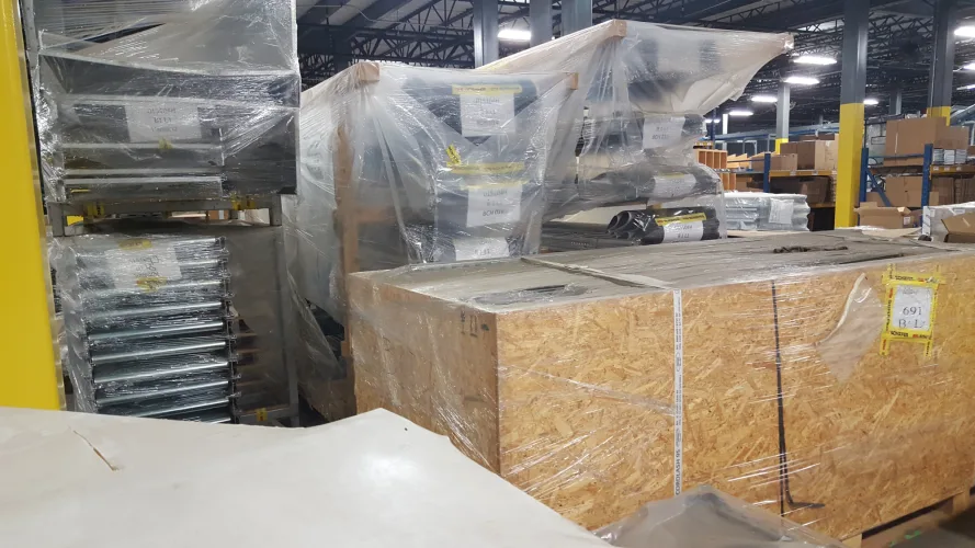 Photo #1 of SOLD - OPTIMUS SORTER TECHNOLOGY HORSESHOE-SHAPED OPTISORTER, NEVER INSTALLED & STILL CRATED ON PALLETS, PURCHASED NEW IN 2016 - SURPLUS TO THE ONGOING OPERATIONS OF HSN'S FULFILLMENT CENTER